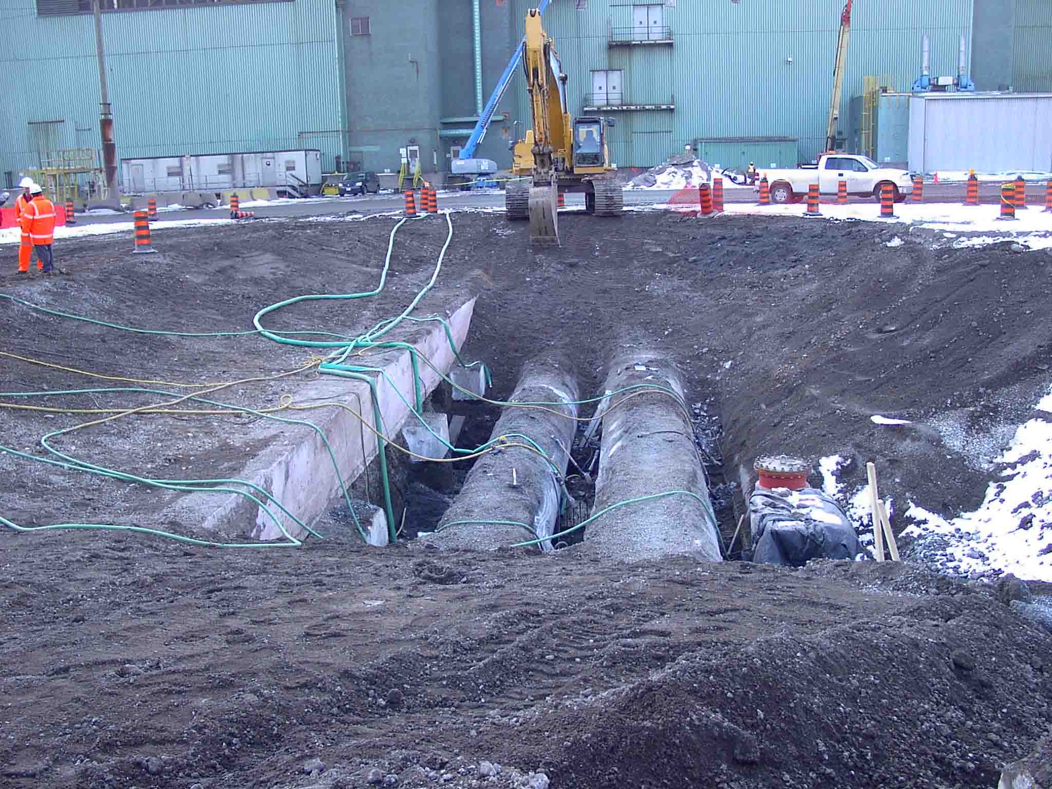 Excavation and preparation for installation of access tees into 54â€, 48â€ and 24â€ watermains during a 4 day shutdown.